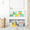Children's wooden bookshelf in white with 3-tier shelves and 2 open compartments for organizing books and toys.