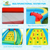Inflatable water park featuring double slides, climbing wall, splash pool, and safety mesh for summer fun.