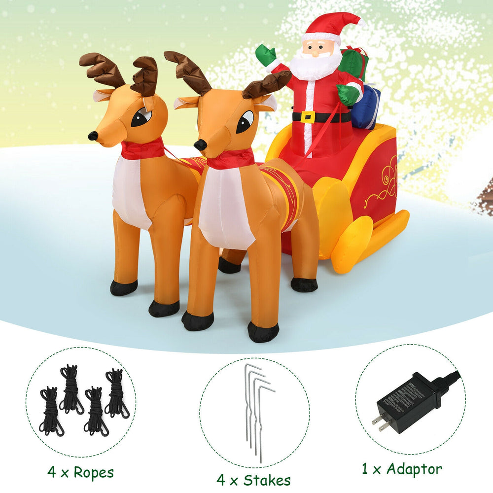 Inflatable Santa in sled with two reindeer, equipped with LED lights for a delightful outdoor Christmas display.