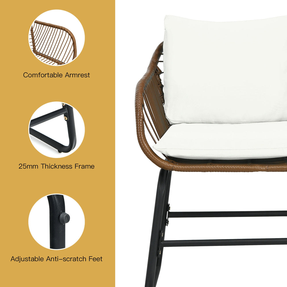 Cushioned armchair from the 3 Pieces Patio Rattan Bistro Set with a durable PE rattan frame for outdoor relaxation.