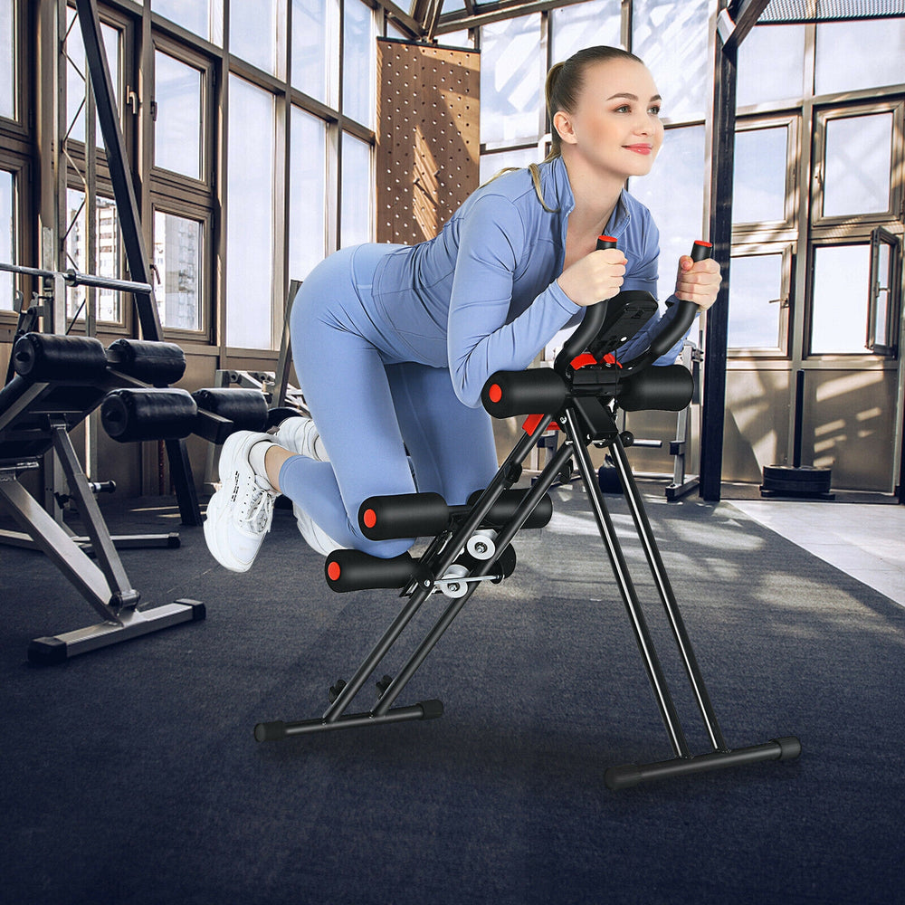 Foldable adjustable core abdominal trainer in use, showcasing padded knee cushion and sturdy design for effective.