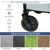 Close-up of the skid-resistant universal wheel of the gray outdoor folding wagon cart, designed for various terrains.