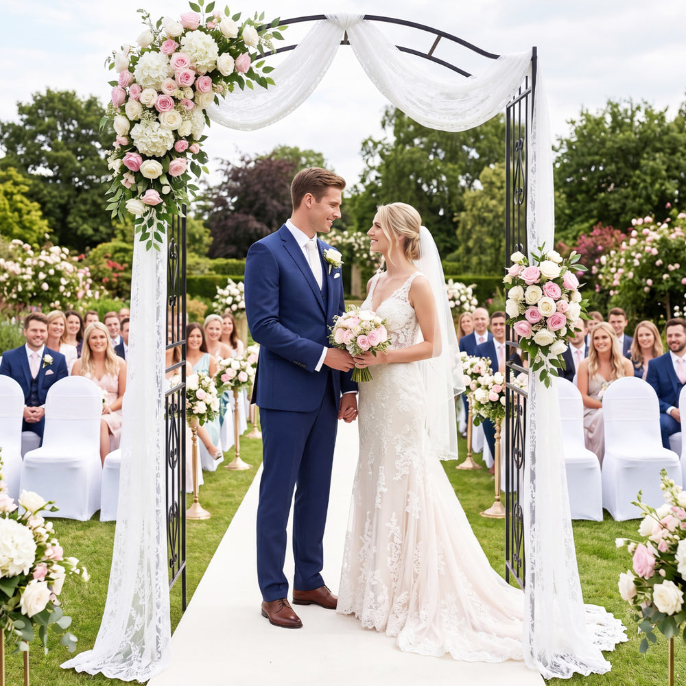 Heavy-duty metal garden arbor with curved roof, ideal for weddings and supporting climbing plants in outdoor settings.