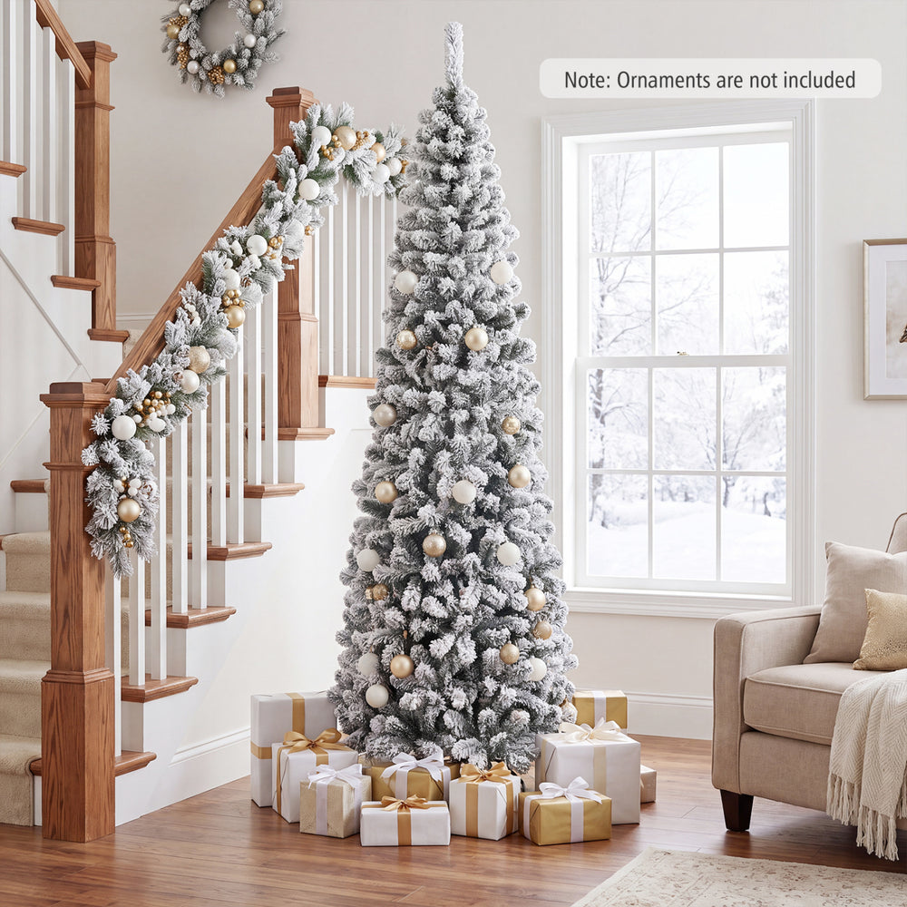 Snow-flocked 7.5 feet pencil Christmas tree with 641 tips, designed for corner placement and enhancing holiday ambiance.