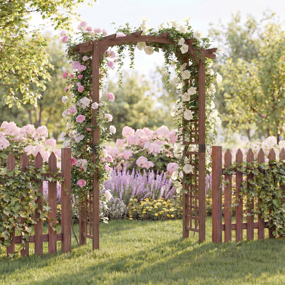 Wooden garden arch trellis in rustic brown, perfect for climbing plants and decorative displays in outdoor spaces.