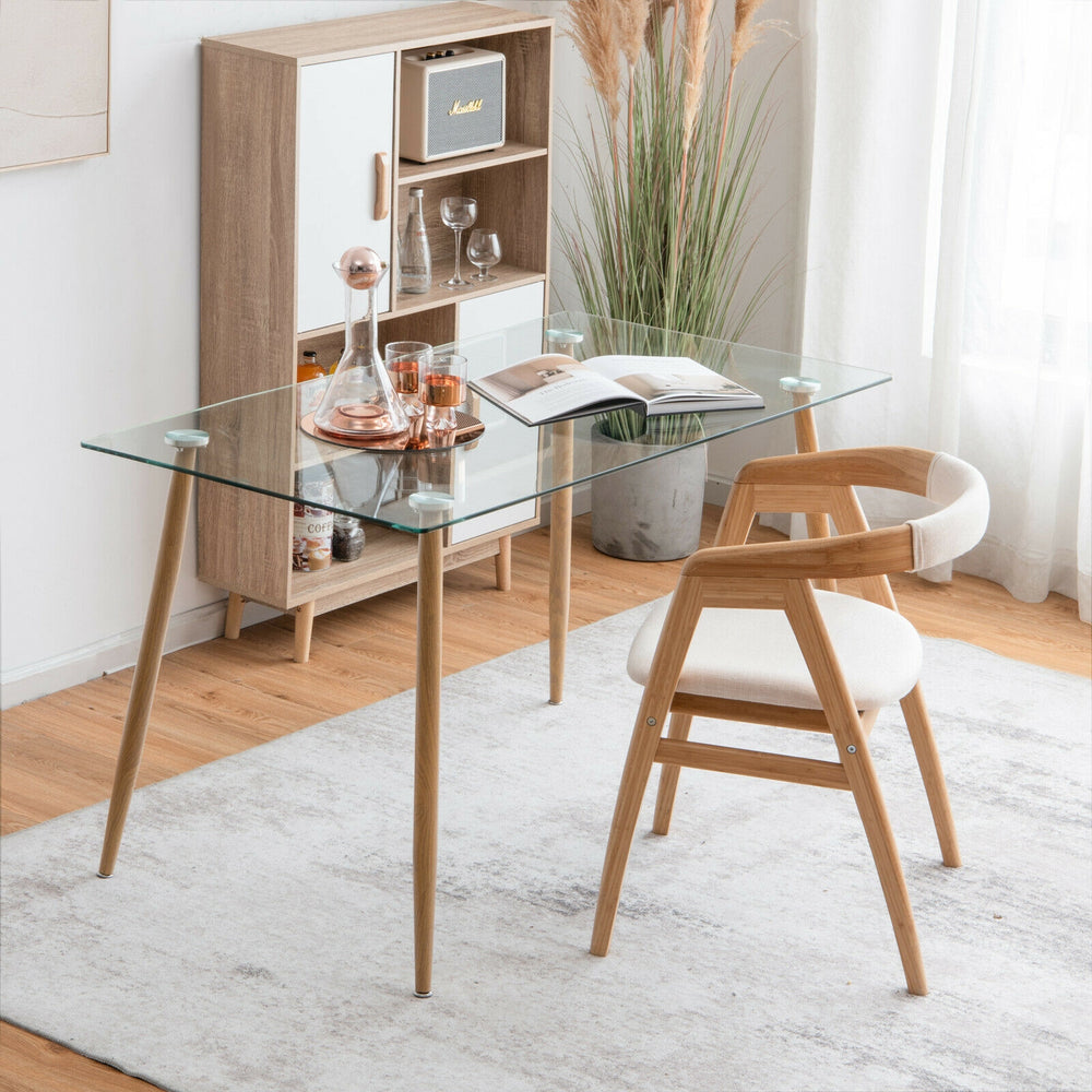Rectangular glass dining table with wood grain imitation legs, ideal for home or office use, showcasing a modern design.