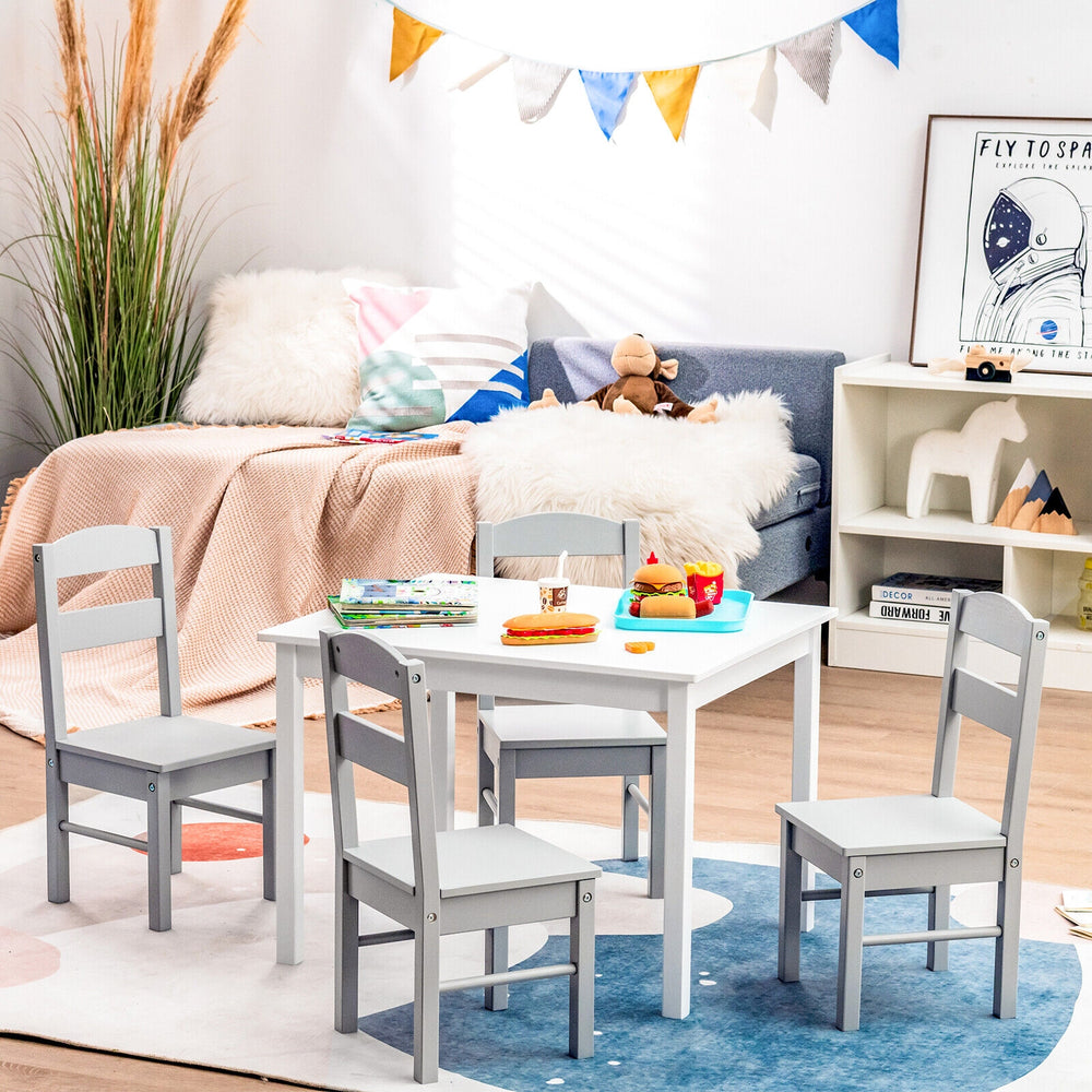 Kids 5-piece table and chair set in white, perfect for playrooms, featuring sturdy wooden construction and rounded.