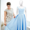 5.8 ft female mannequin with detachable arms and aluminum stand, ideal for displaying clothing in retail settings.