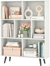 7-cube bookcase with tapered metal legs, featuring ample storage for books and decor, ideal for home organization.