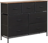 Wide 7-drawer dresser in black with a wood top, featuring removable fabric drawers for versatile bedroom storage.
