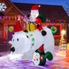 7-foot inflatable Santa Claus riding a polar bear with penguin, featuring LED lights and weather-resistant fabric for.