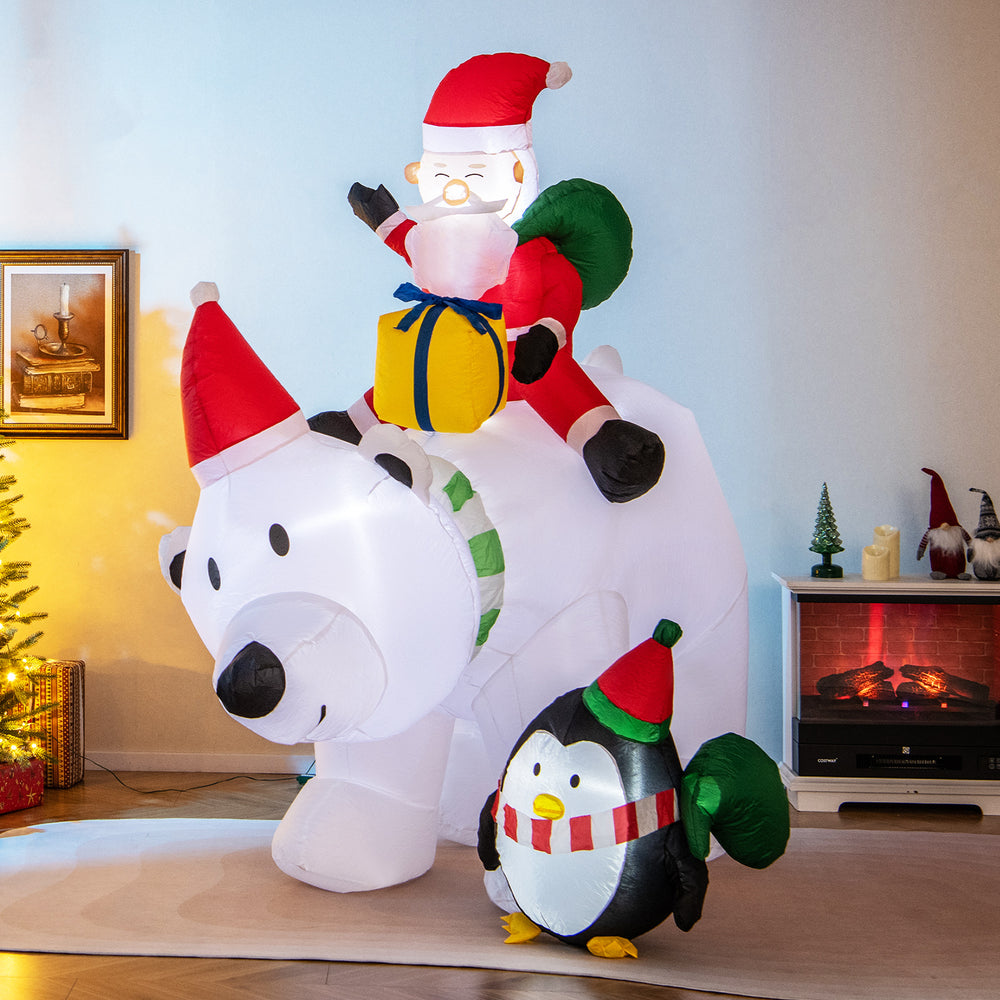 Inflatable Santa Claus riding a polar bear with a penguin, featuring LED lights, for festive indoor or outdoor.