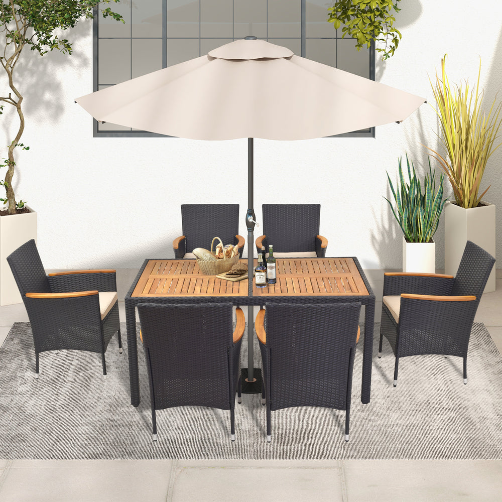 Full view of the 7-piece outdoor dining set with six rattan chairs and umbrella hole, designed for comfortable backyard.
