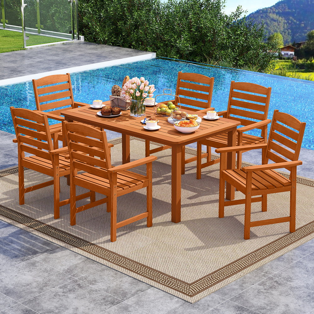 7-piece outdoor dining set with teak oil finish, featuring a slatted rectangular table and 6 armchairs, perfect for.
