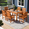 7-piece outdoor dining set with teak oil finish, featuring a slatted rectangular table and 6 armchairs for patio.