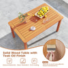 Solid wood dining table with teak oil finish, slatted design, and umbrella hole, perfect for outdoor patios and.