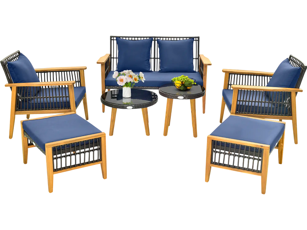 7-piece outdoor conversation set featuring acacia wood frame and navy cushions, perfect for backyard or poolside.