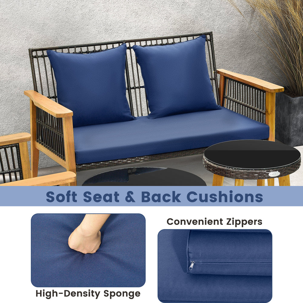 Cozy navy seat and back cushions with zippers on a stable acacia wood frame for outdoor relaxation.