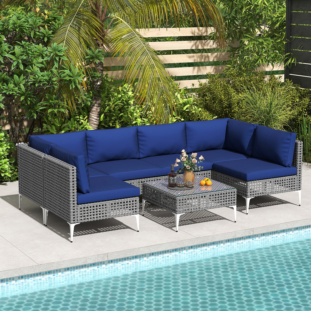 Navy 7-piece outdoor furniture set with wicker chairs and tempered glass coffee table, perfect for poolside relaxation.