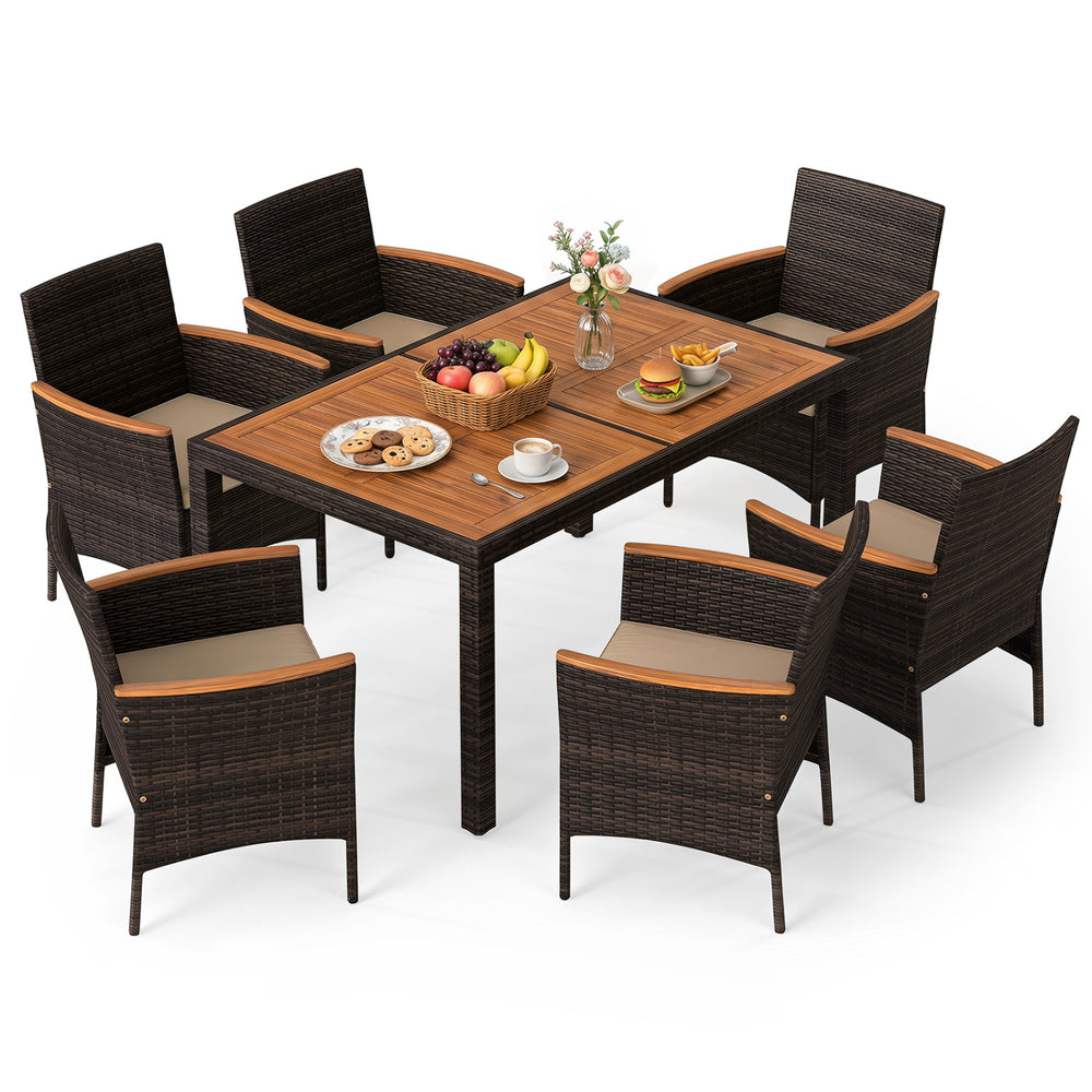 Close-up of the acacia wood tabletop on a 7-piece patio dining set, showcasing the rich grain and ample space for meals.