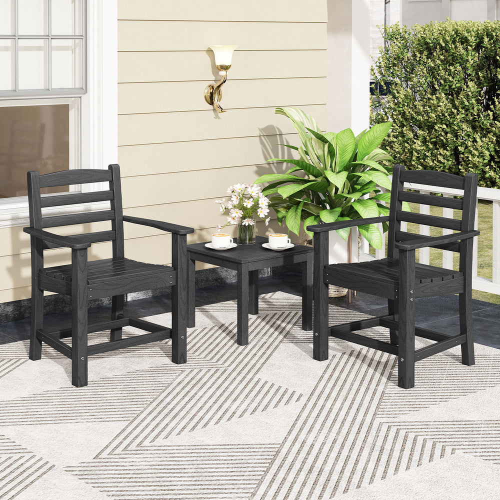 Two black armchairs and a small table from a 7-piece outdoor dining set, perfect for intimate gatherings on the patio.