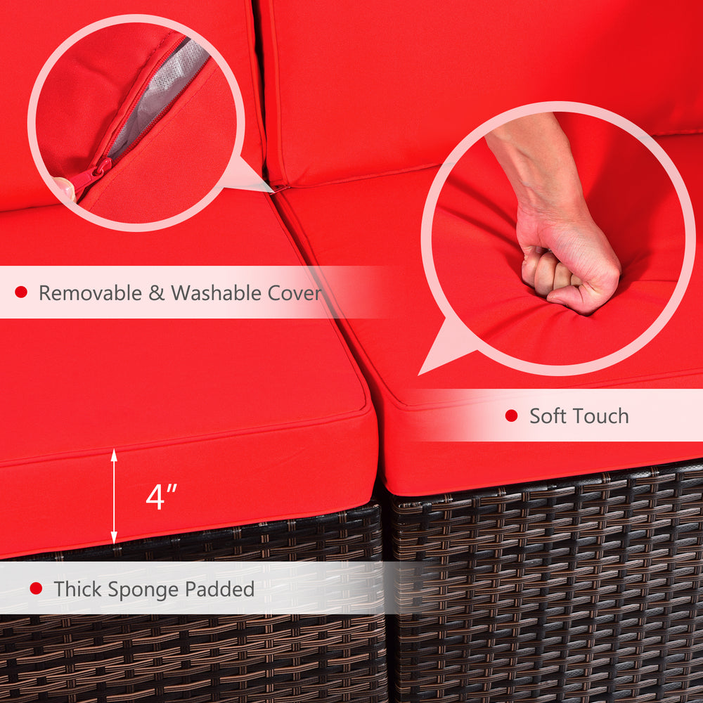 Close-up of soft, removable red cushion on a patio furniture set with thick sponge padding for comfortable seating.