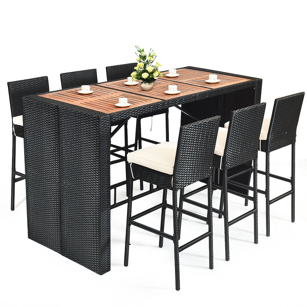 7-piece patio rattan wicker dining set with a rectangular table and 6 bar stools, perfect for outdoor gatherings.