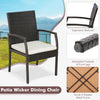 Patio wicker dining chair with ergonomic backrest, soft cushion, and adjustable footpads for outdoor comfort.