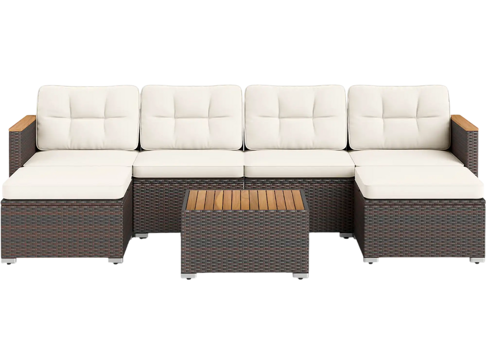 U-shaped 7-piece wicker conversation set with white cushions and acacia wood armrests for stylish backyard seating.