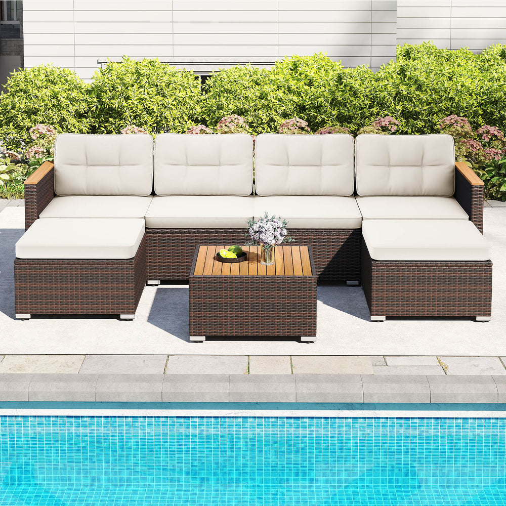 U-shaped 7-piece wicker conversation set with acacia wood armrests and cushions, perfect for backyard relaxation by the.