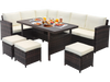 7-piece wicker patio furniture set with white cushions, featuring a wide slatted tabletop, ideal for garden or poolside.