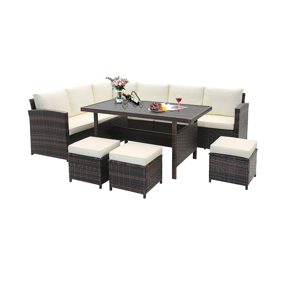 7-piece wicker patio furniture set with cream cushions, featuring a wide slatted tabletop for outdoor relaxation.
