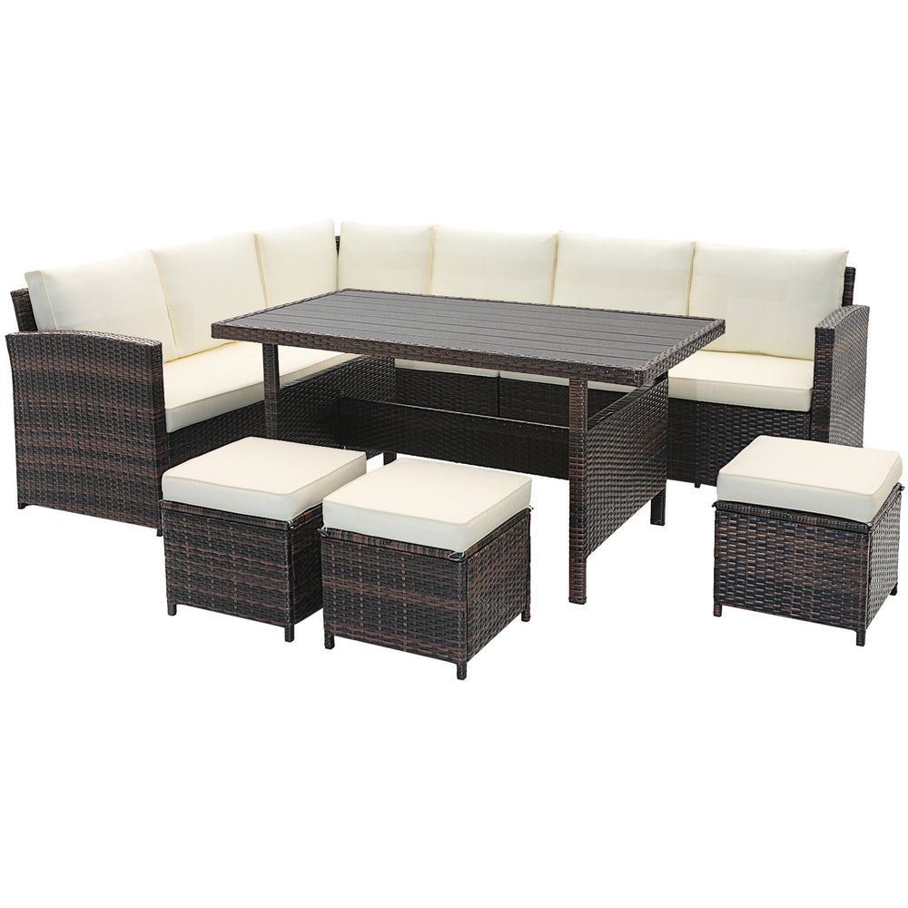7-piece wicker patio furniture set with cream cushions, featuring a wide slatted table and durable brown rattan for.