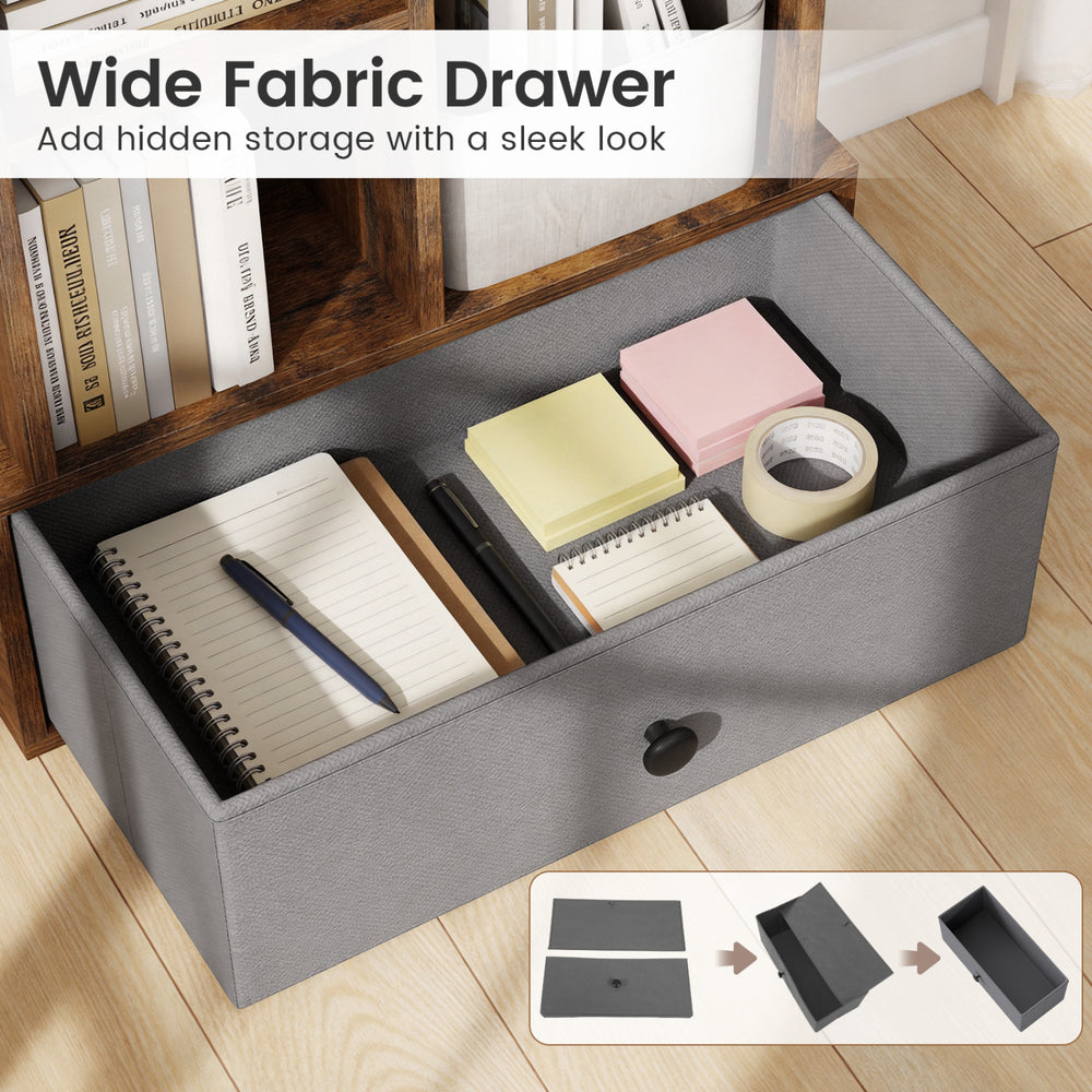 Wide fabric drawer in rustic brown bookshelf offers hidden storage for notebooks, tape, and stationery in a sleek.