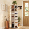 7-tier rotating shoe rack tower in white, designed for up to 28 pairs, perfect for compact corner storage.