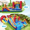 7 in 1 outdoor inflatable bounce house with water slides, featuring dry and wet play areas for backyard fun.