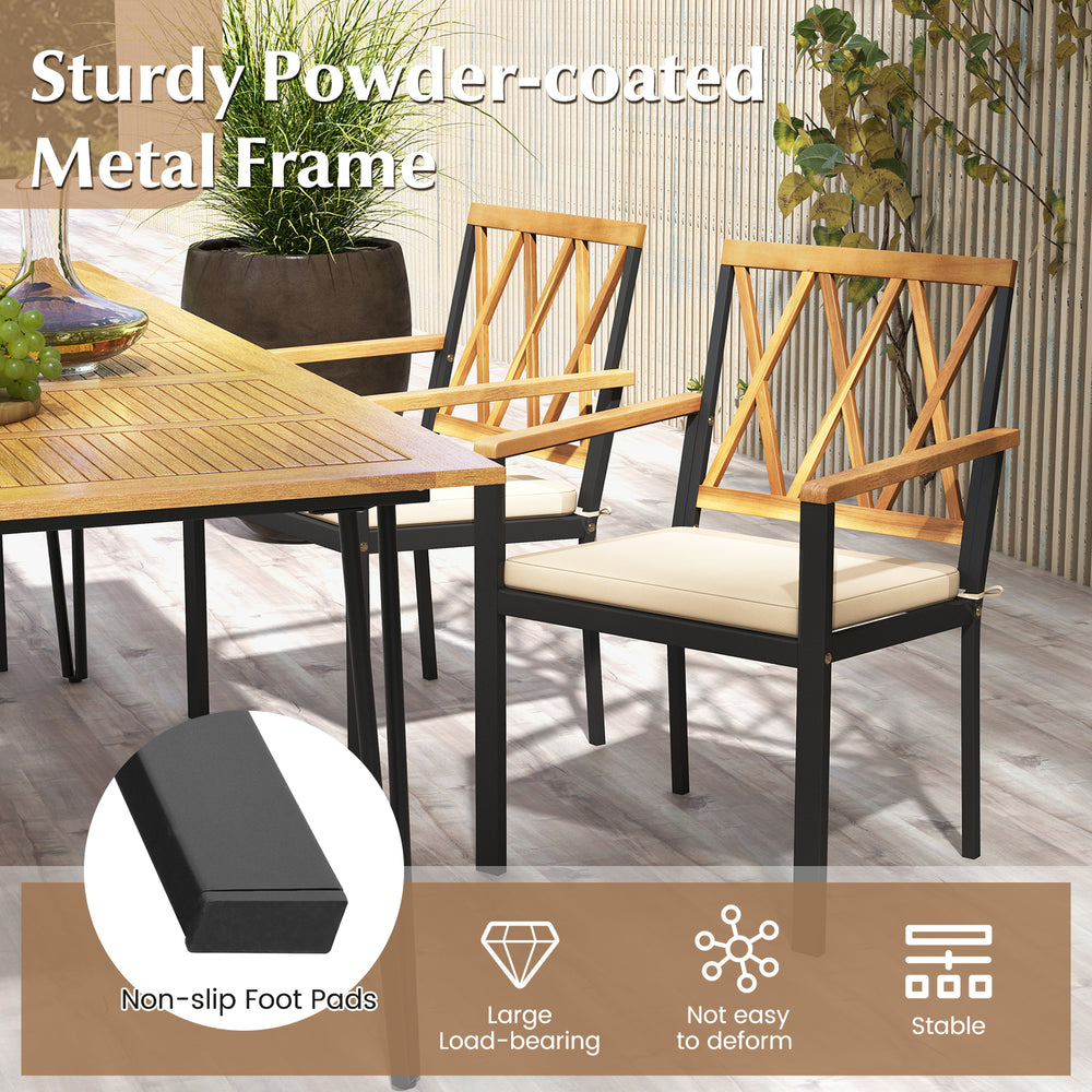 Two chairs from the 7 Piece Patio Acacia Wood Dining Set with powder-coated metal frame and removable cushions for.