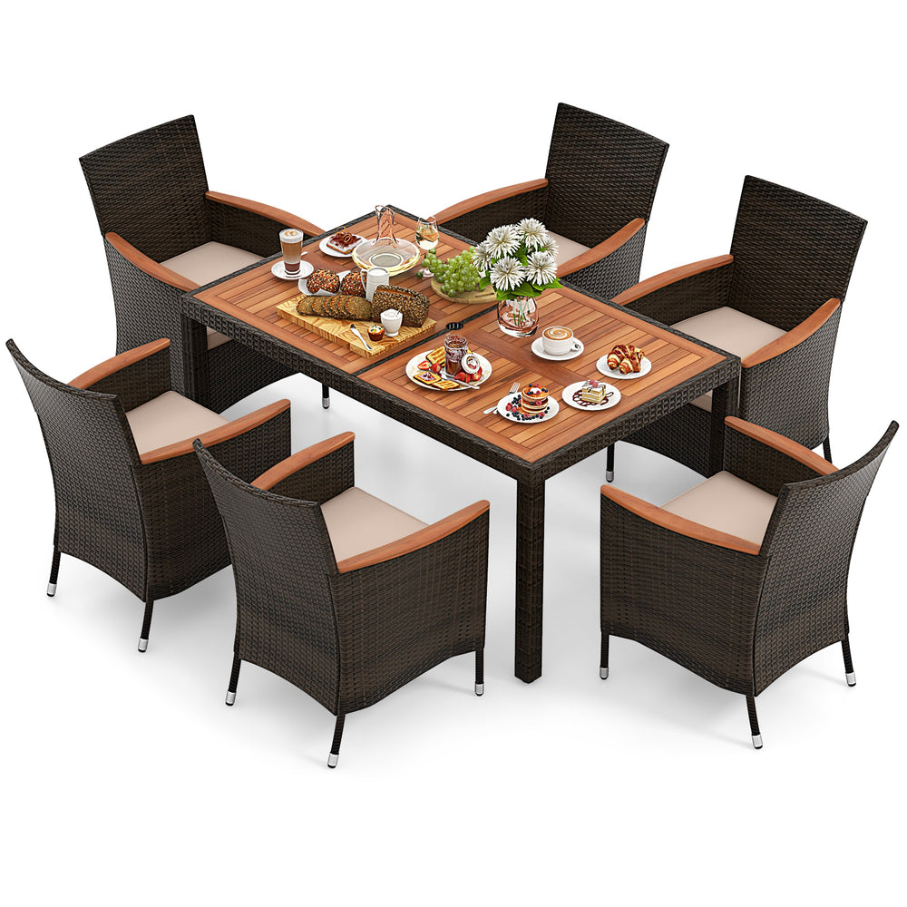 Elegant 7-piece garden dining patio rattan set with acacia wood table and cushions, perfect for backyard gatherings.
