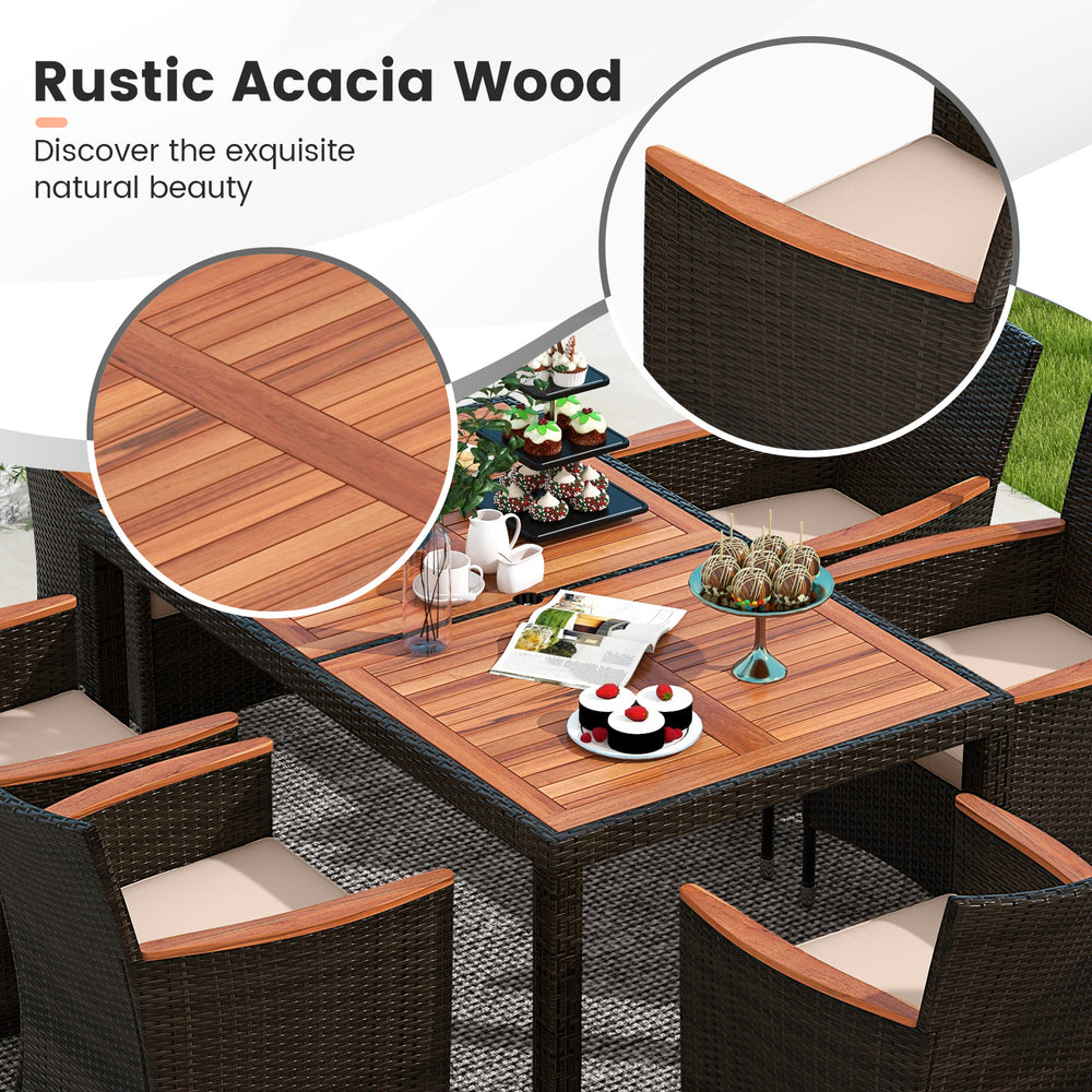 Close-up of the rustic acacia wood table top in a 7-piece garden dining patio rattan set for outdoor use.