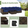 Sectional sofa set with navy cushions, made of PE rattan and sturdy steel, perfect for patio and garden relaxation.