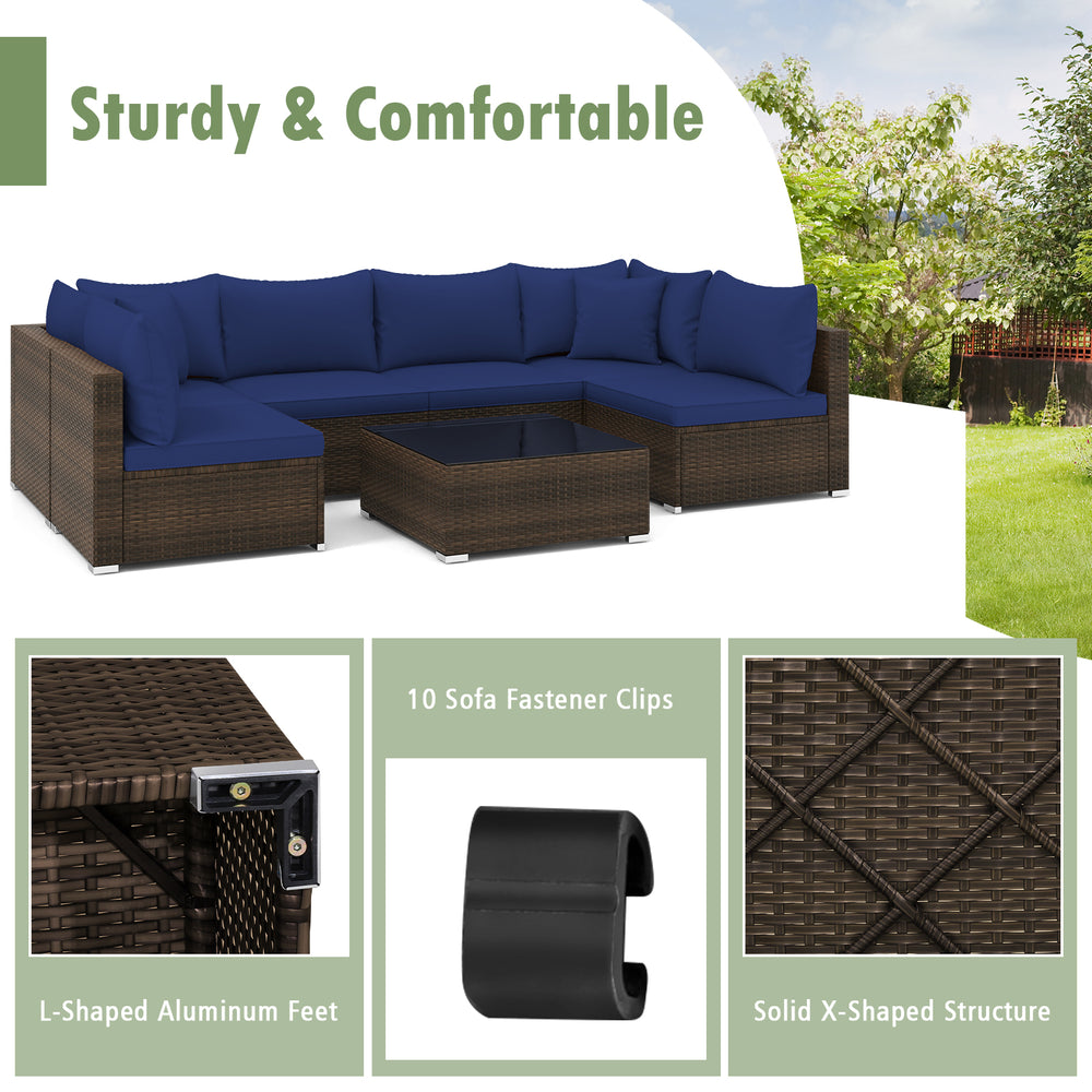 Sectional sofa set with navy cushions, made of PE rattan and sturdy steel, perfect for patio and garden relaxation.