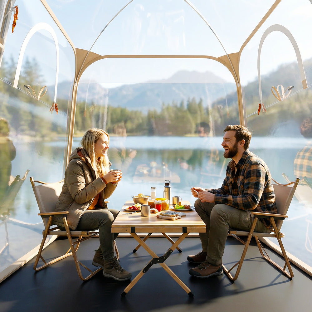 Clear bubble tent with a sealed floor, perfect for camping and outdoor relaxation by the lake.