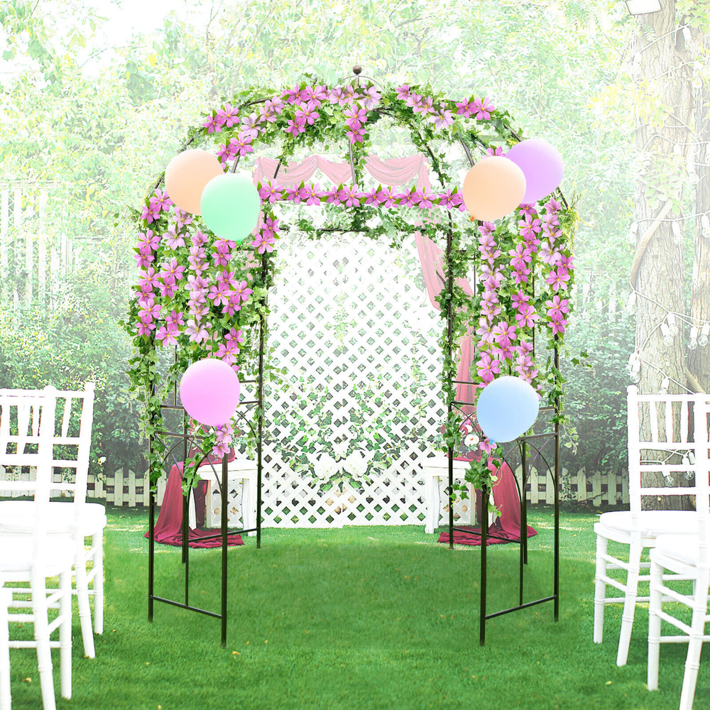 Birdcage shape garden arbor in vintage bronze, adorned with flowers and balloons, ideal for outdoor events and.