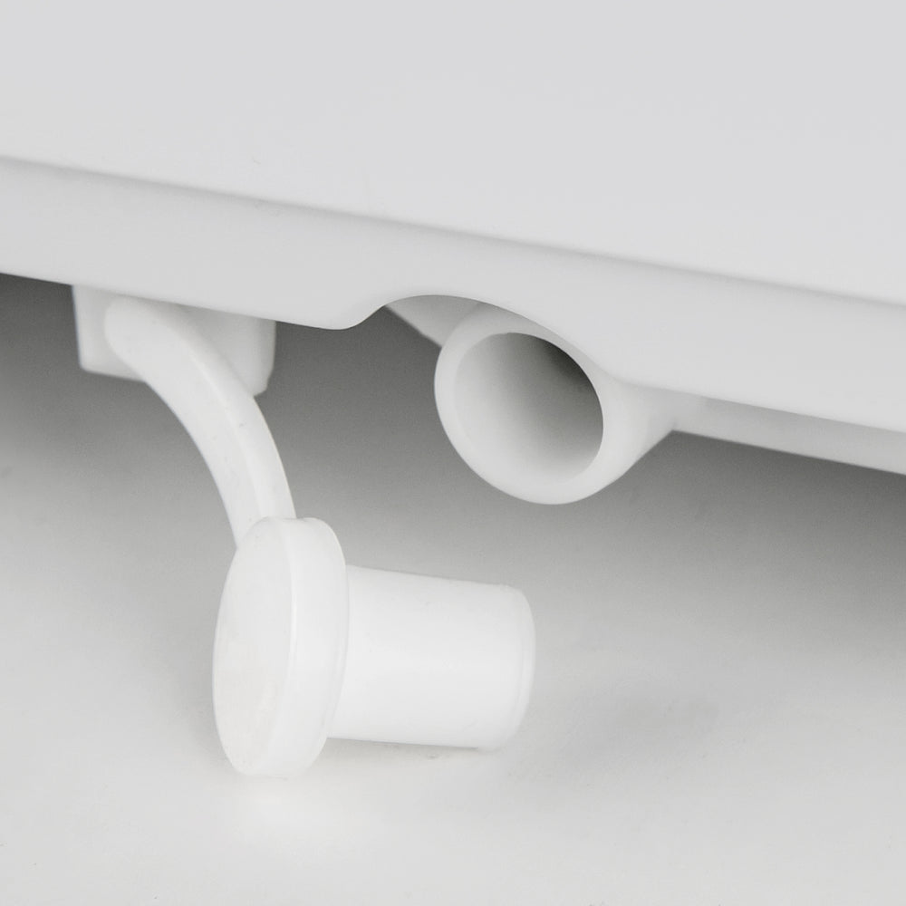 Close-up of the drainage outlet on the 8000 BTU portable air conditioner, designed for efficient cooling and.