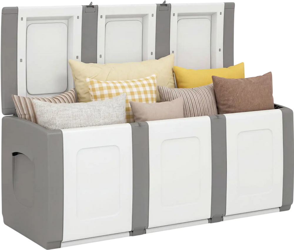 Gray 80-gallon patio container with lockable lid, filled with cushions, designed for outdoor storage and stylish use.