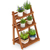 Foldable 3-tier solid wood plant stand with potted plants, ideal for patio or balcony display and optimal sunlight.