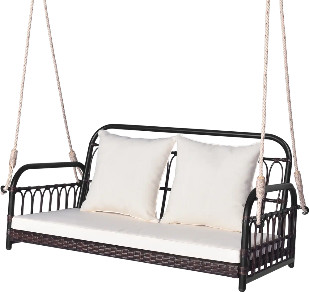 Wicker hanging porch swing with white cushions, 880 lbs capacity, ideal for outdoor relaxation in garden or backyard.