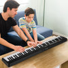 88-key foldable electric keyboard piano in black, featuring dual speakers and wireless MIDI, perfect for music learning.