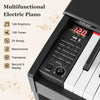 88-key weighted keyboard in black with control panel, featuring 128 rhythms and tones for versatile music creation.