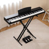 88-key black keyboard piano set with adjustable stand and pedals, featuring dual speakers and removable music stand.